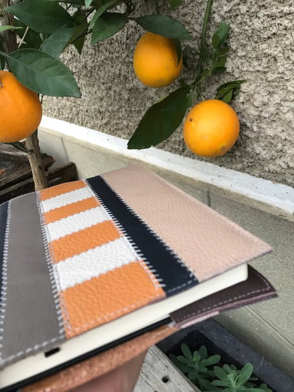 Couverture de notebook en patchwork de cuir