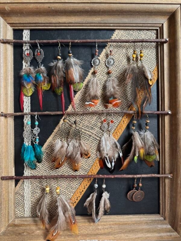 Tableau des boucles en plumes